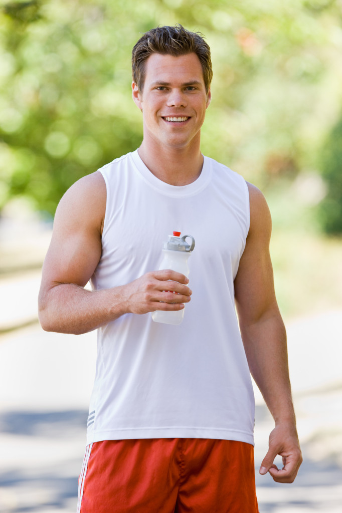 Runner drinking water