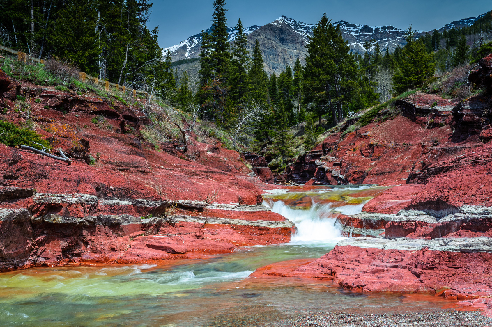 Red Rock creek With Vimy Peak and woodlands