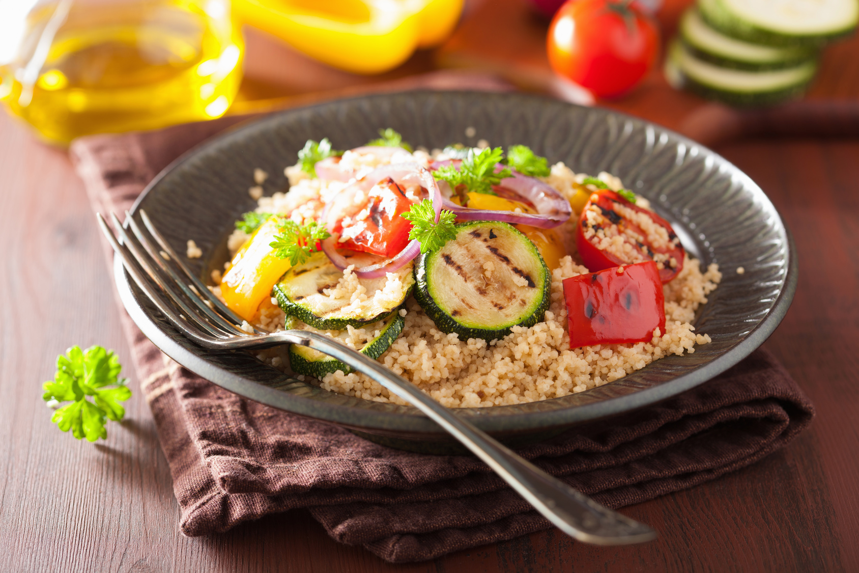 healthy couscous salad with grilled tomato pepper zucchini onion