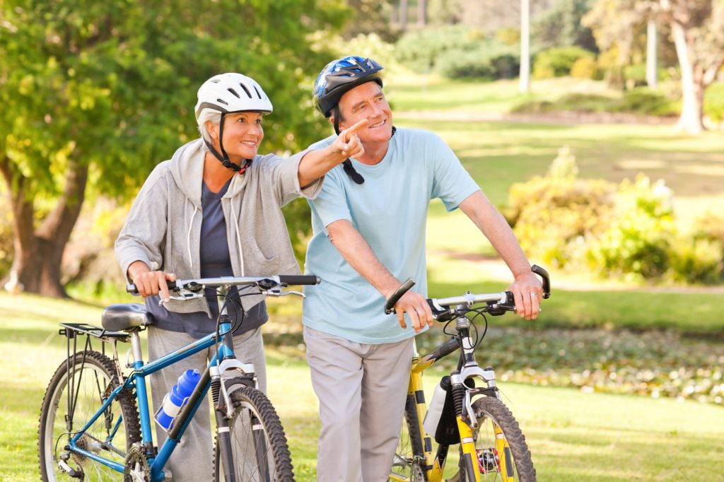 Mature couple with their bikes