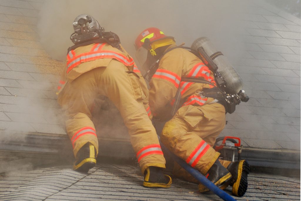 working an active attic fire in a dwelling on fire