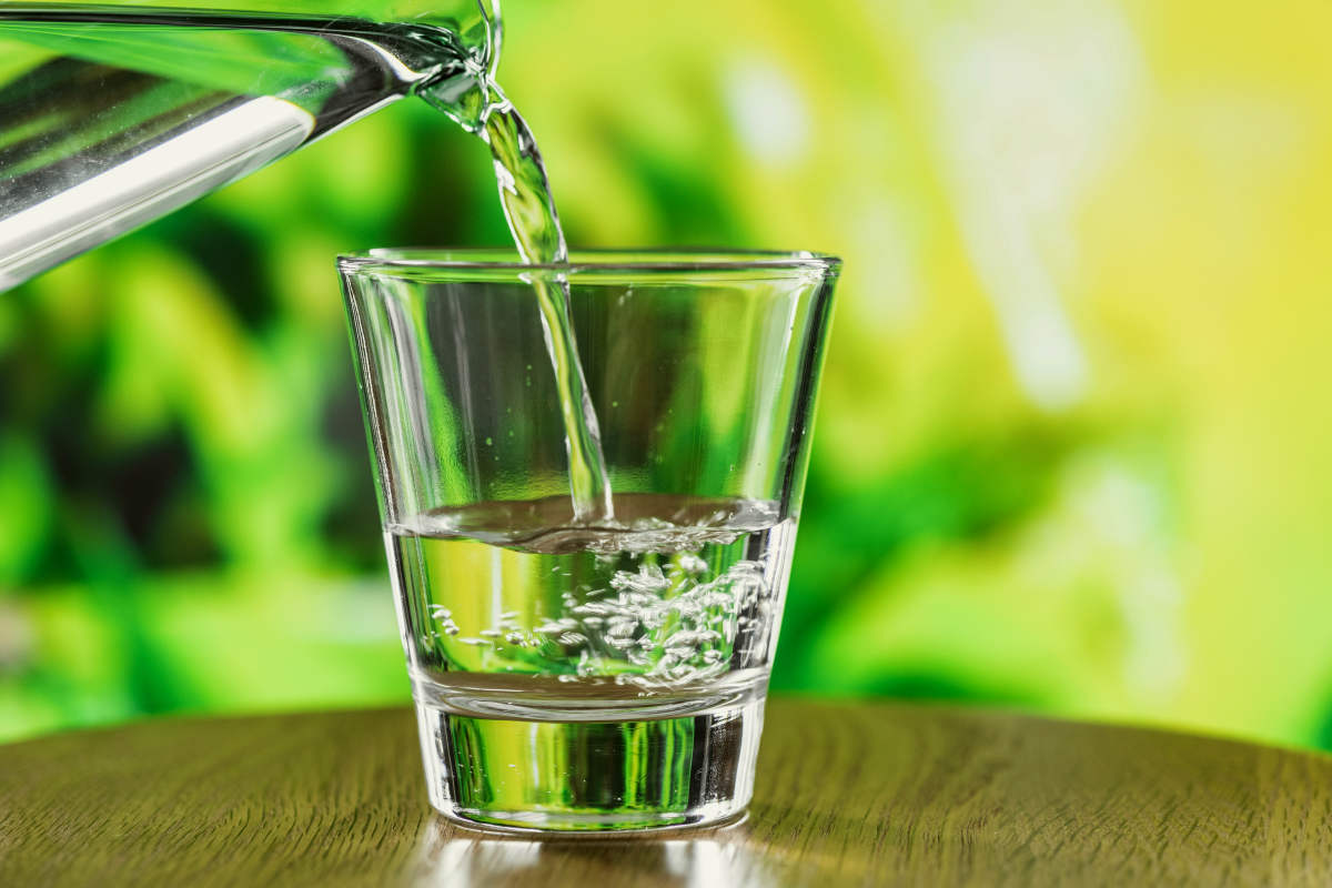 Pouring water in the glass | What Is Alkaline Water? | What You Need To Know