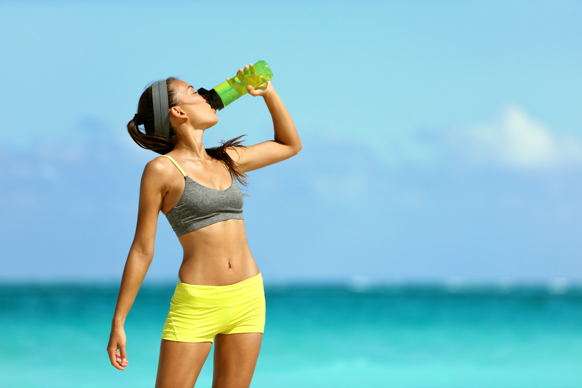 Fitness runner woman drinking water | Everything You Need To Know About Healthy Eating