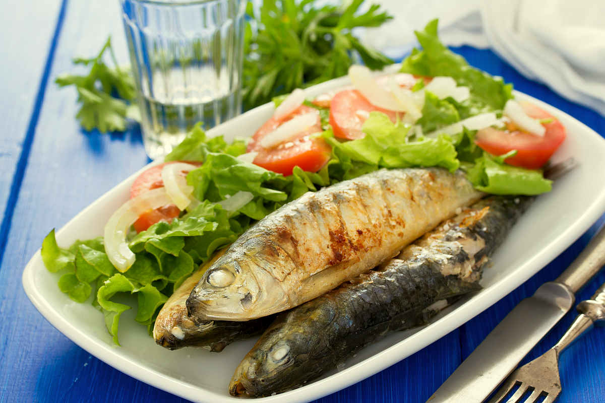 Grilled Sardines salad on white dish | Most Nutritious Foods to Add to Your Diet
