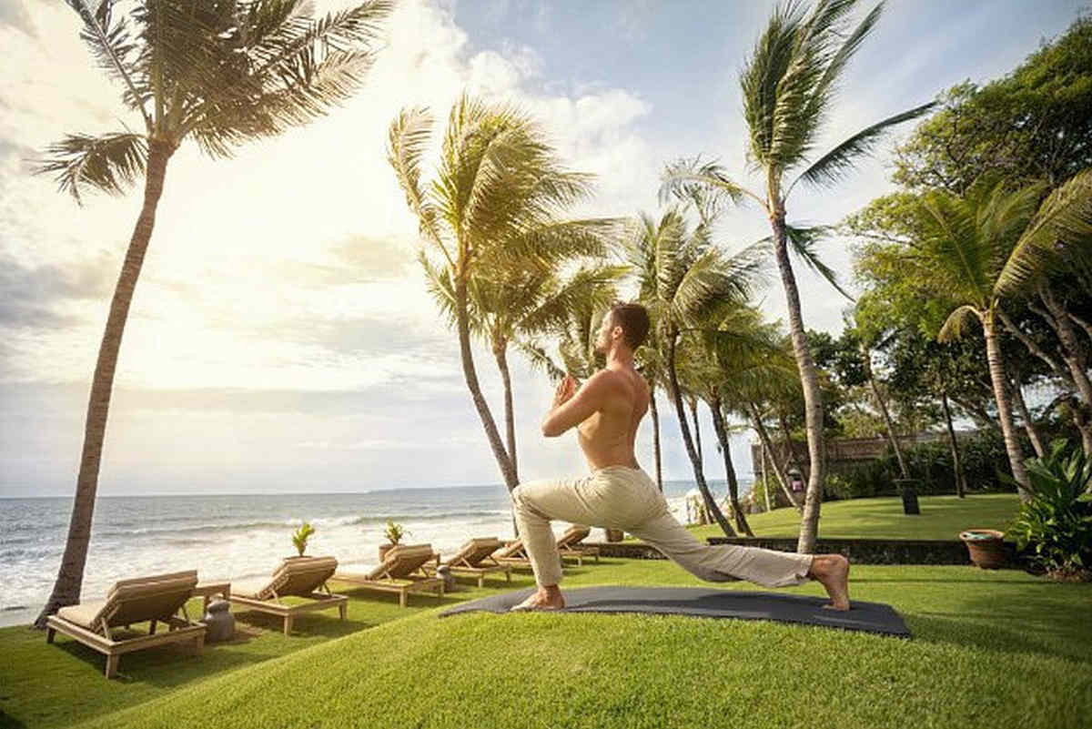 Man practicing yoga | Hydrate Yourself Happy With Alkaline Water!