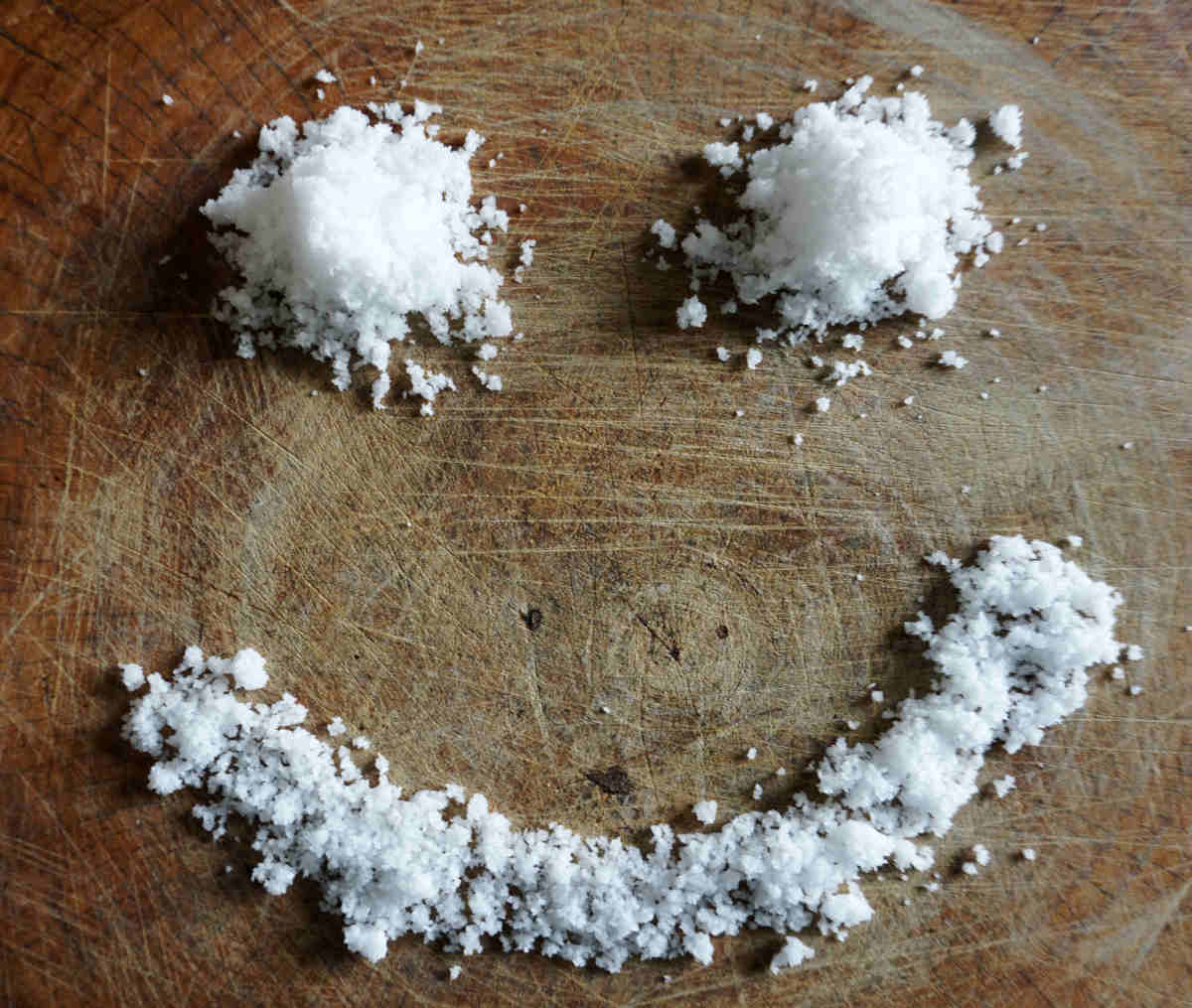 Smile salt on wood background | Epsom Salt Benefits | Epsom Salt: Health Benefits