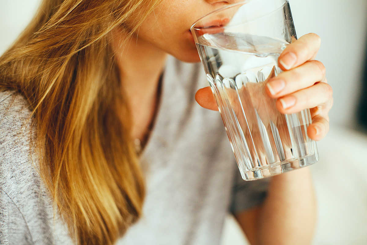 Woman drinking water | How To Drink More Water | Ways To Stay Hydrated