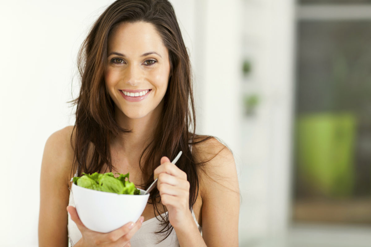 Woman eating healthy | Everything You Need To Know About Healthy Eating