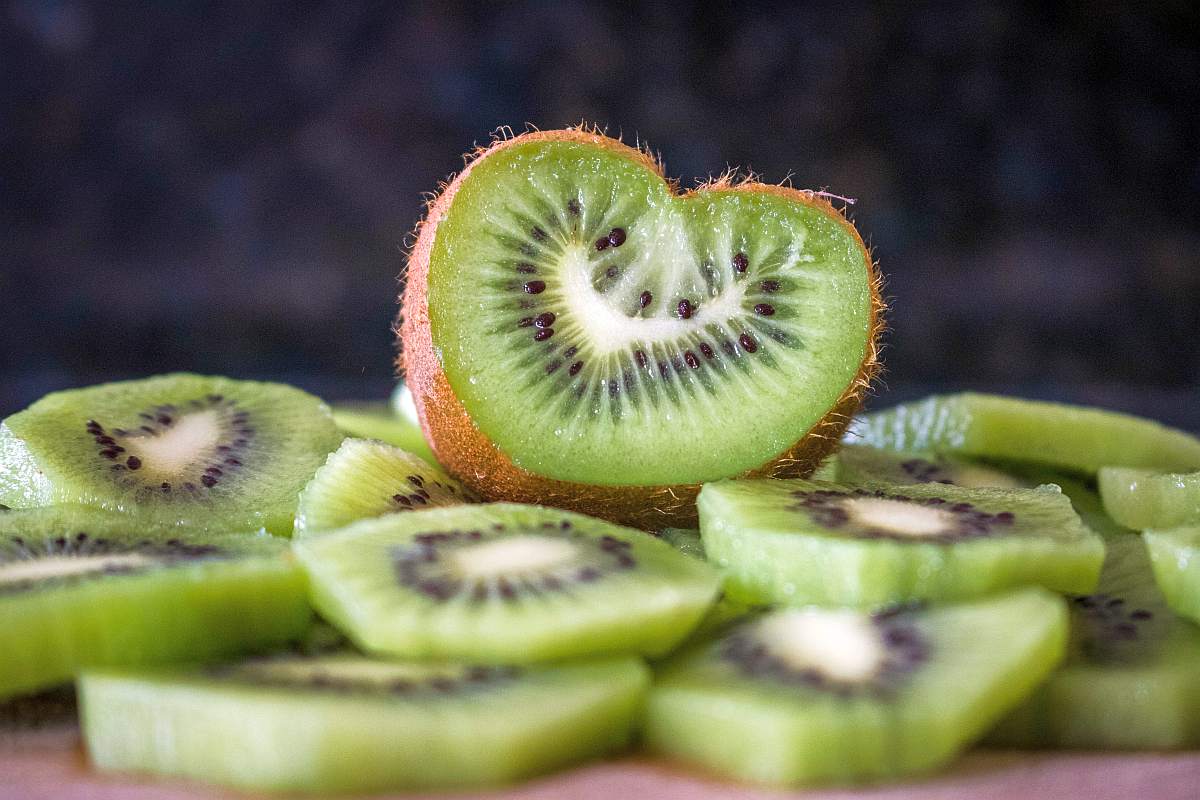 Slice of kiwi | High Alkaline Foods To Add To Your Diet