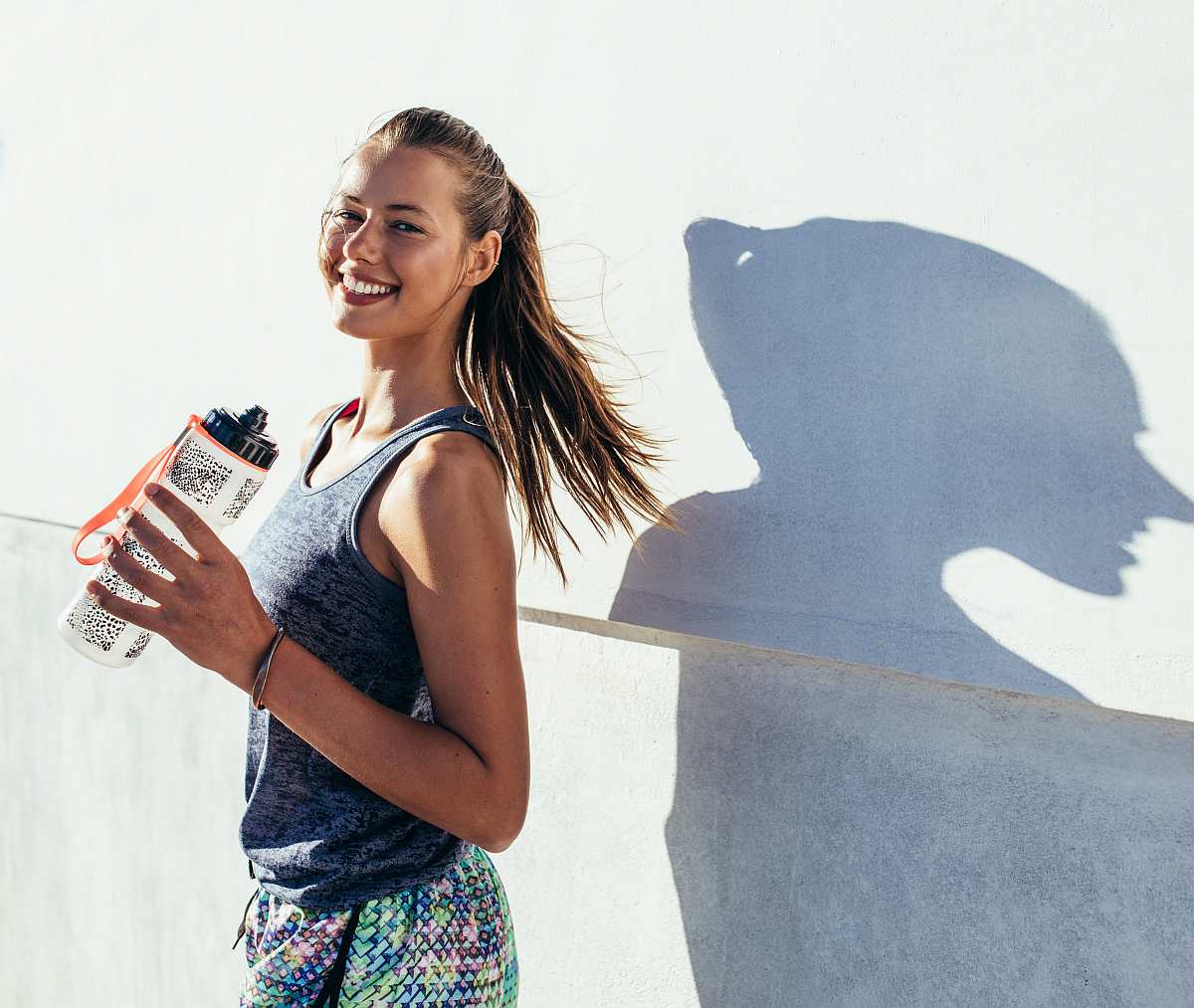 Beautiful female runner standing outdoors | Beautiful | Reasons To Love Tyent Water Ionizers