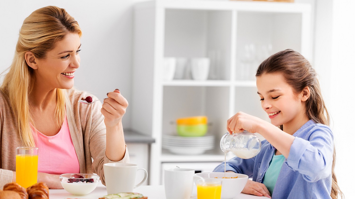 Feature | Mother daughter eating breakfast | Health Benefits of Probiotics