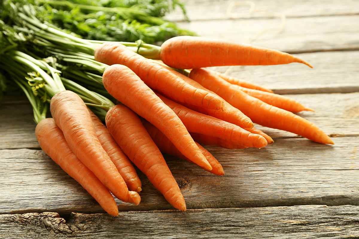 Carrots on a wooden table | Healthiest Foods To Eat
