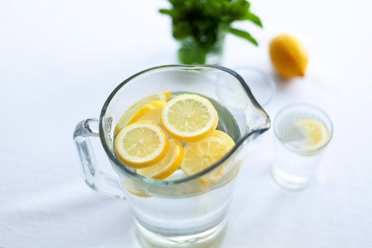 Lemon water in pitcher | Why Alkaline Water Is Better For Hydration