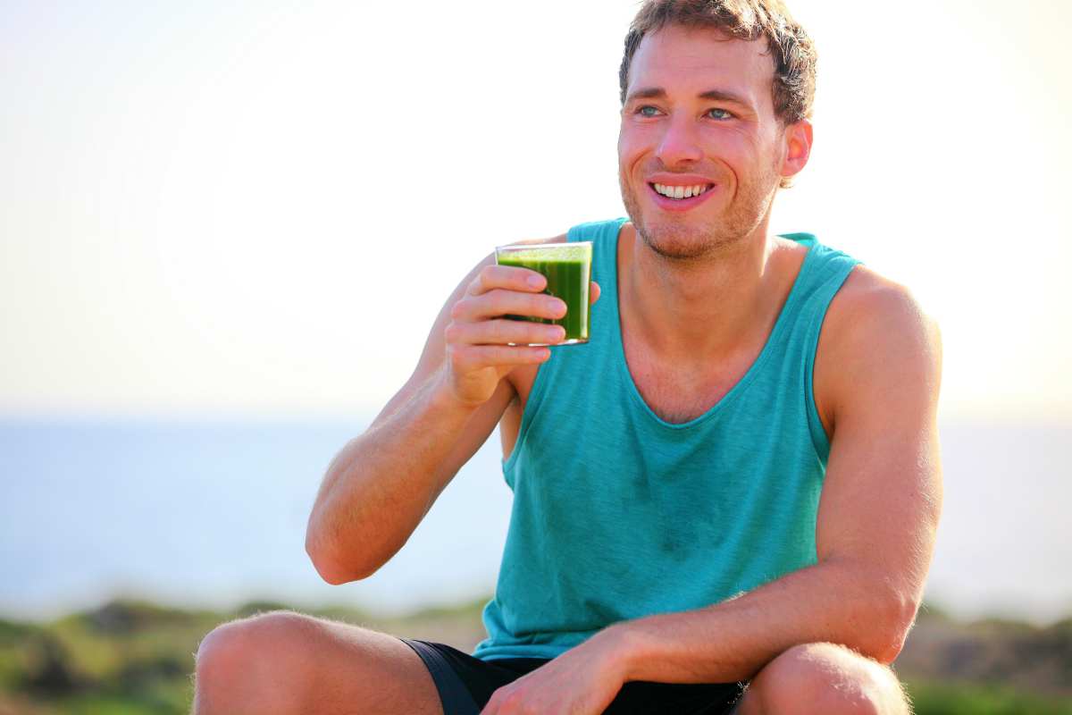 Handsome man drinking green juice | Healthy Juice Recipes You Should Try