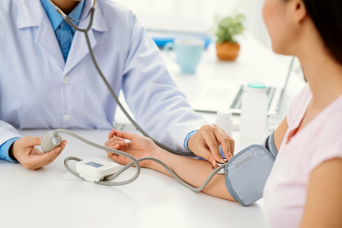 Doctor checking patient blood pressure | Reasons Why Processed Meat Is Bad For Your Health