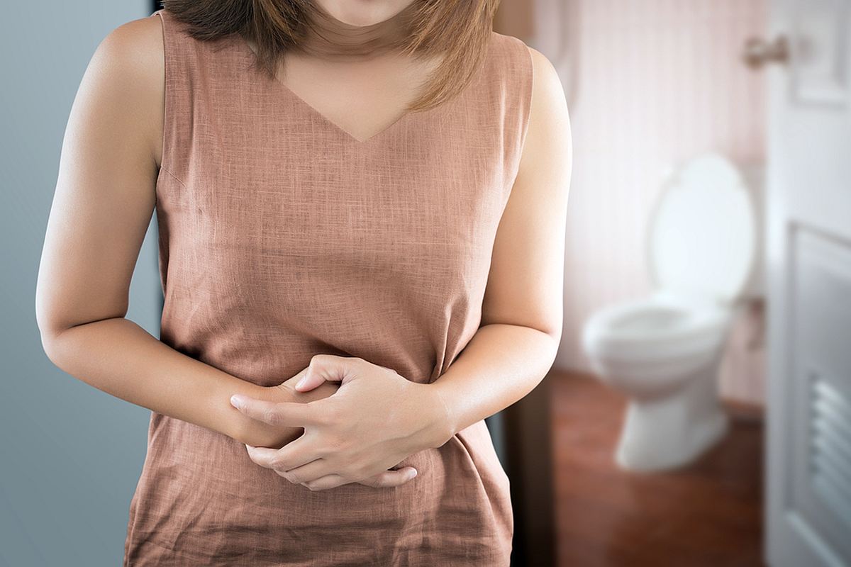 Woman with upset stomach | Reasons Why Acidic Water Is Bad For You