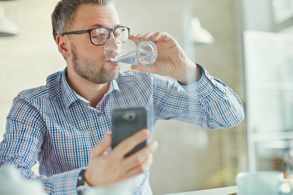 Man drinking water | What Exactly Is pH Level and Why Should I Care?