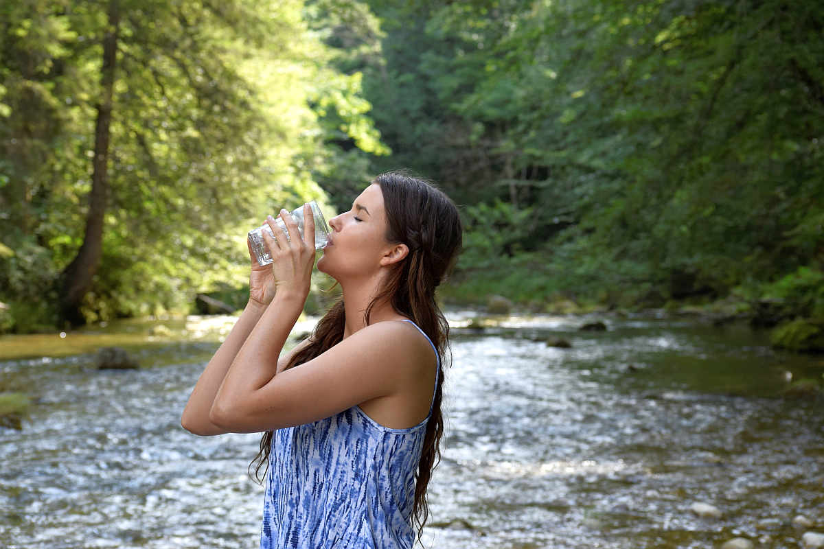 River water woman girl drink | Reverse Osmosis Process: How Does It Work?