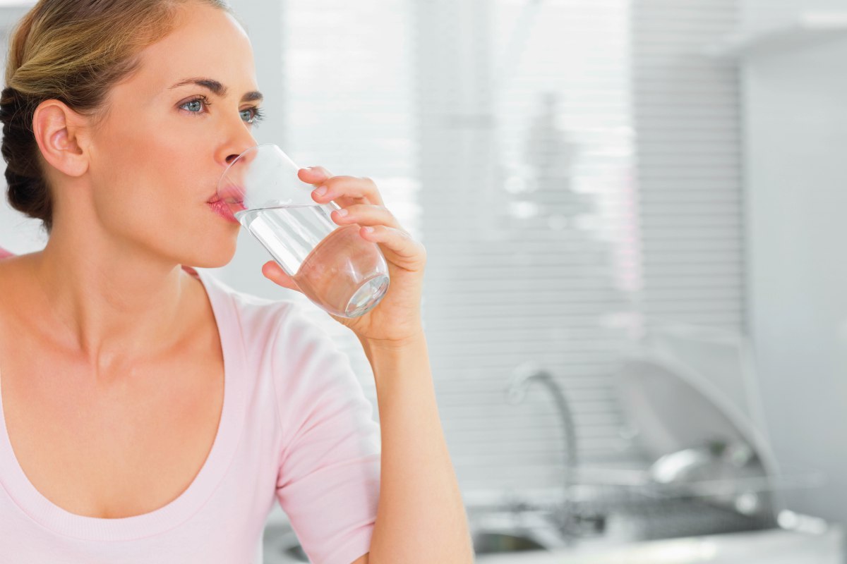 woman drinking water | Wastewater Treatment: Is It Safe To Drink Recycled Water? | wastewater treatment plant